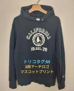 【チャンピオン】トリコタグ3段アーチマスコットプリントパーカー M