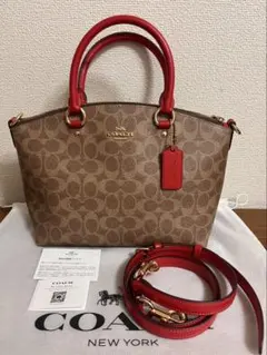 COACH サディ サッチェル バッグ シグネチャー キャンバス