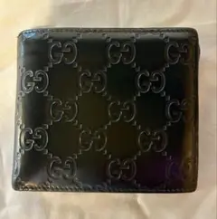 正規品　ハワイ購入　グッチ GG シマ　レザー　二つ折り財布 黒　小銭入れ不良