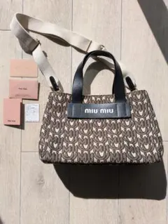 新品】MIU MIU キャンバス 2WAYミニバッグ ペイントフラワー カナパ