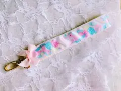 ファンシーなベビー柄リボンハンドストラップ♡