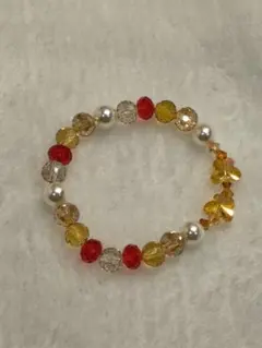 ハンドメイド 赤と黄色のビーズブレスレット