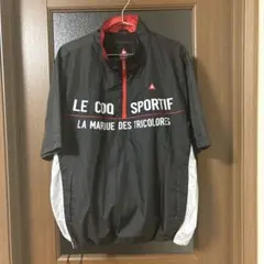 LE COQ SPORTIF 半袖ジャケット ブラック/レッド