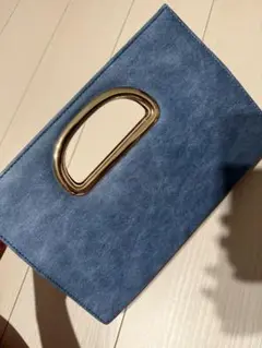 ブルー ハンドル付きクラッチバッグ