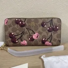 新品未開封 COACH チェリー柄 二つ折り財布 箱・保存袋付 - メルカリ