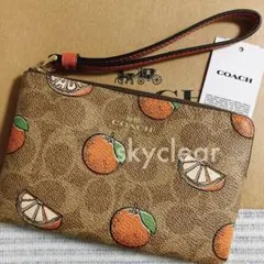新品❇︎正規品 COACH オレンジ リストレット ポーチ 小物入れのサムネイル