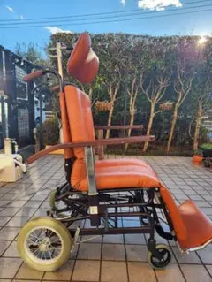 オレンジ色のティルトリクライニング介助用車椅子 リクライニング式（ティルト連動） 介助用車いす KPF16-40(42