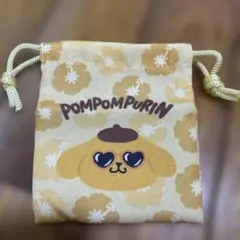 ポムポムプリン 巾着袋 ハイビスカス柄　黄色　日焼け　ダイソーのサムネイル