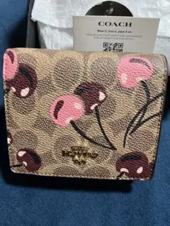 COACH チェリー柄 二つ折り財布 - メルカリ