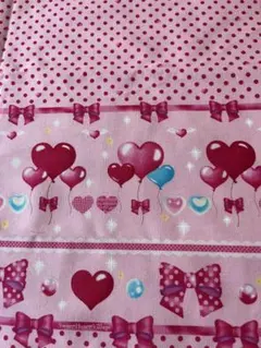 ハートとリボンのピンクの布地 はぎれ