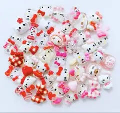 ハローキティ　赤　ピンク　ネイルパーツ　デコパーツ