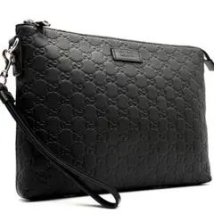 未使用に近い グッチ クラッチバッグ ロゴプレート シマレザー GG メンズ 黒