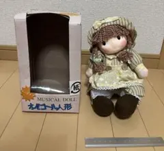 昭和レトロ SANKYO首振り回転人形 タグ付オルゴール人形 - メルカリ