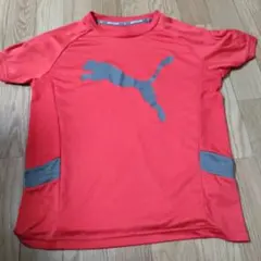 Puma オレンジ ロゴ入りシャツ　150