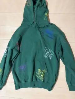 supremeオリーブ色 フード付きパーカー アートプリント - メルカリ