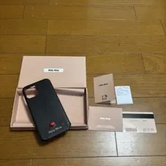 MIUMIU ミュウミュウ マドラスラブ iPhone12 携帯カバー 黒のサムネイル