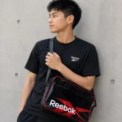 Reebok エナメル ショルダーバッグ 黒 赤 ロゴ スポーツのサムネイル