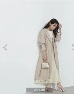 ナチュラルビューティーベーシック　クリアツイルドレストレンチコート