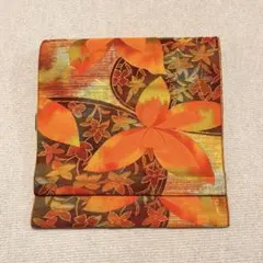 【B56】オレンジ 草花模様 単帯 名古屋帯