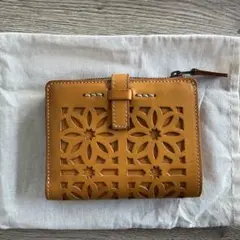 ゲンテン　カットワーク 二つ折り財布　イエロー