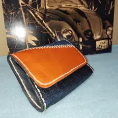 オレンジと黒とデニム生地 革レザー三つ折り財布