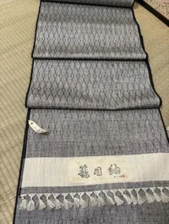 紬 反物 ヨモギ色 絣柄 トゥイグワー - メルカリ