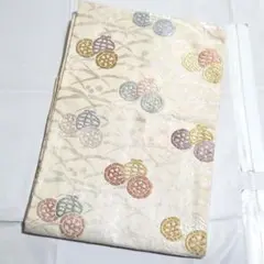 A 唐織 露草に車輪模様 金糸 白 六通 正絹 フォーマルな名古屋帯