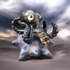 An octopus riding on a sea urchin.
