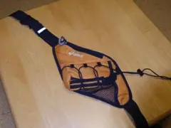 asics ボディバッグ オレンジ/ブラック