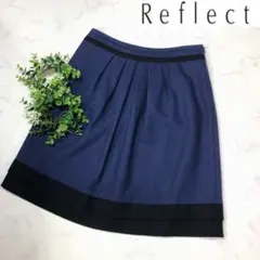 リフレクトのネイビー色バイカラースカート11号L