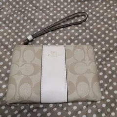 Coach ベージュ ロゴポーチ