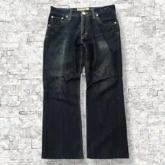 ブーツカットデニム ワイド 布タグ インディゴブルー アメカジ シティボーイ古着のサムネイル