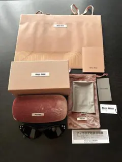 miu miu サングラス ブラック ビジュー付きのサムネイル