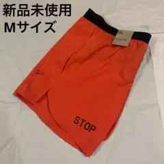 オレンジ ショートパンツ