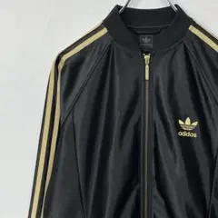 アディダスオリジナルス　SST トラックジャケット　黒 金