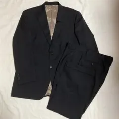 R・KIKUCHI　スーツ　黒　ストライプ　ウール混　AB6