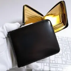 【新品未使用】COMME des GARCONS 二つ折財布 ゴールド 小銭入付のサムネイル