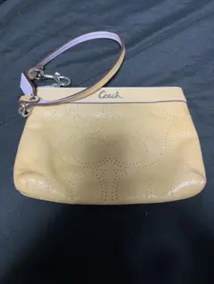 Coach ベージュ パターン入り ポーチ