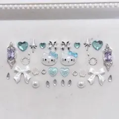 ネイルパーツ　サンリオ　キティ　ブルー　シルバーリボン　ハートビジュー　パール