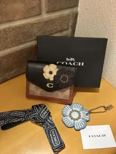 COACH 二つ折り財布 フラワーモチーフのサムネイル