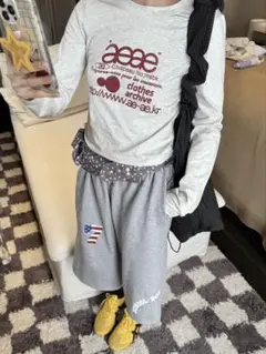 aeae プリント 長袖Tシャツ