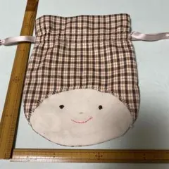 チェック柄の顔付き巾着袋　❻