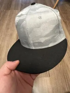 NEWERA9FIFTY グレーと黒の迷彩キャップ