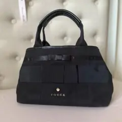 TOCCA ブラック ハンドバッグ リボン付き 撥水・A4サイズ対応】RIBBON BRICK A4TOTE トートバッグ / TOCCA
