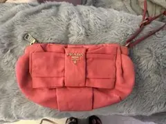 PRADA リボン付きピンククラッチバッグ