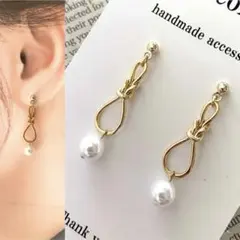 ハンドメイドピアス　パール　リボン　ゴールド　揺れる