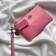 【新品未使用⭐︎送料込み】COACH コーチチャーム付ポーチ