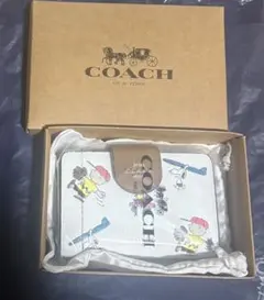 新品未使用 COACH 二つ折り財布 スヌーピー