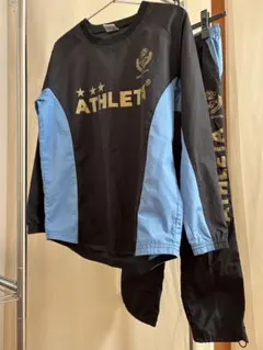 ATHLETA ピステ・ウィンドブレーカー ブラック/ライトブルー 上下 160