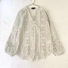 【セオリー】幾何学模様レースブラウス Vネック 後ロング 袖口ボタン P M相当のサムネイル